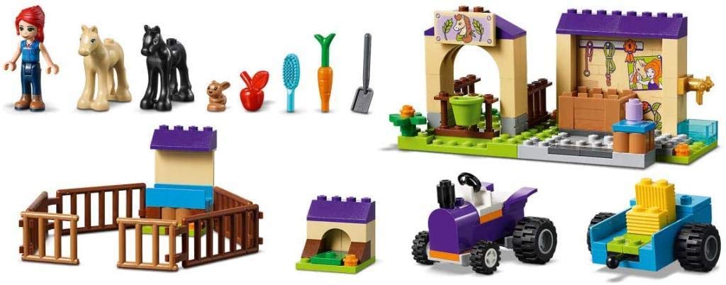 LEGO 41361 Friends Mia's Foal Stable, playset with Mia as a mini doll, 2 foal figures, rabbit figure and tractor with trailer, farm toys for children
