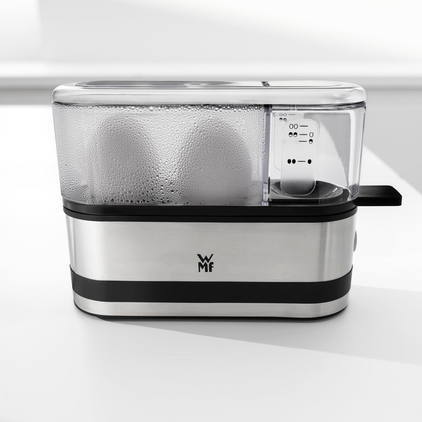 WMF Küchenminis egg cooker made of Cromargan, cooks 1-2 eggs optimally soft, medium or hard, easy setting for optimal results, 250 W, measuring cup, egg pick, space-saving design - 415020011