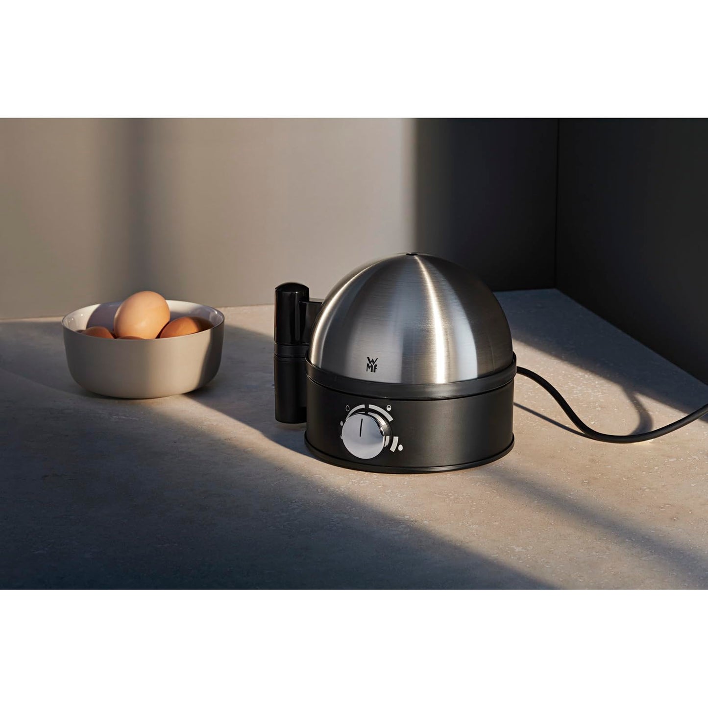 WMF Stelio egg cooker made of stainless steel, 1-7 eggs, newly developed technology for well-boiled eggs soft-medium-hard, easy hardness adjustment, 380 W power, including measuring cup with egg pick - 415070011