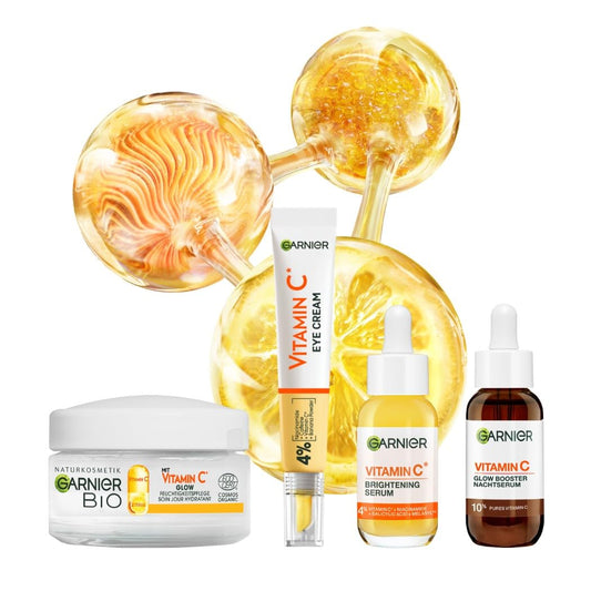 Garnier SkinActive Coffret Max Glow Booster Set pentru zi și noapte cu ser anti-pete întunecate cu vitamina C, cremă pentru ochi Glow Booster cu vitamina C și ser de noapte Glow Booster cu vitamina C.