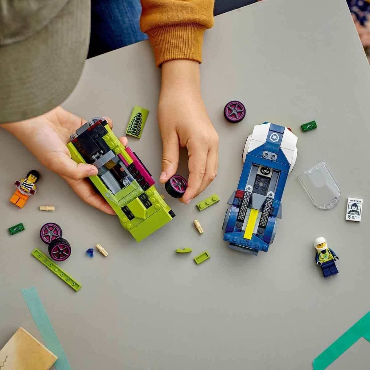 LEGO City chase with police car and muscle car, car toy train with 2 racing cars, police gift for children, boys and girls aged 6 and over, set with policeman and crook minifigures 60415