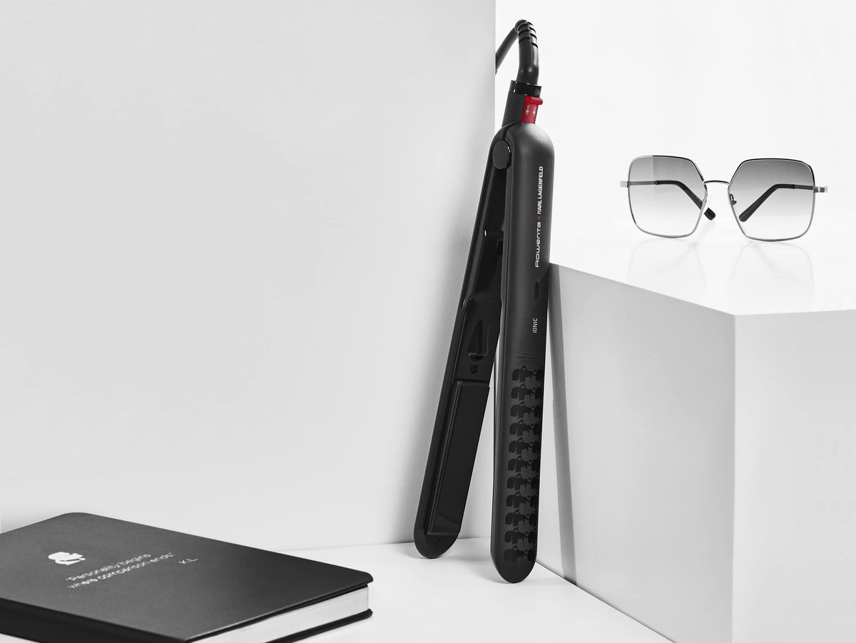 Rowenta Optiliss Ionic SF323L hair straightener with ceramic coating for smooth hair, 10 temperature settings up to 230 degrees, efficient straightening, heats up in 30 seconds, curls and waves, black.
