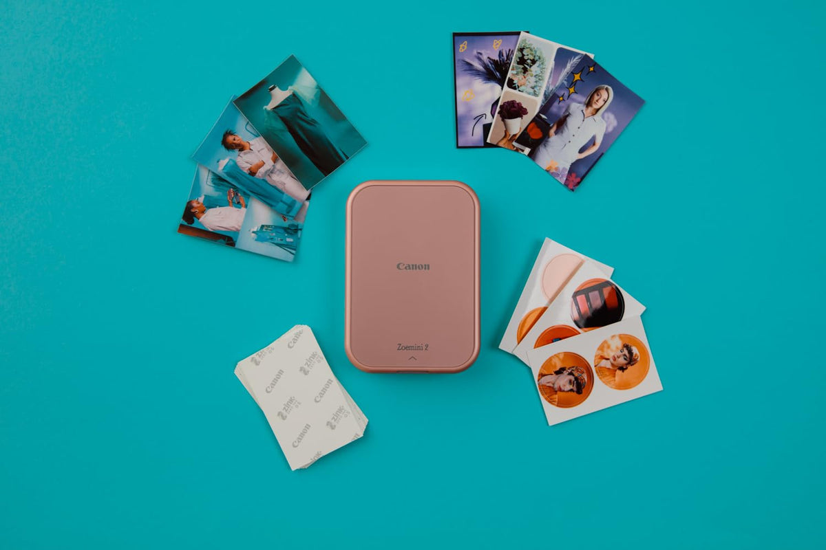 Canon Zoemini 2 Mini Fotodrucker mobil, portabil, ideal pentru utilizare în deplasare, se încadrează ușor în buzunar. Kit de imprimare & ZP-2030 cu hârtie foto Zink originală, 50 de foi. Zoemini este o cameră foto instantanee/imprimantă foto.