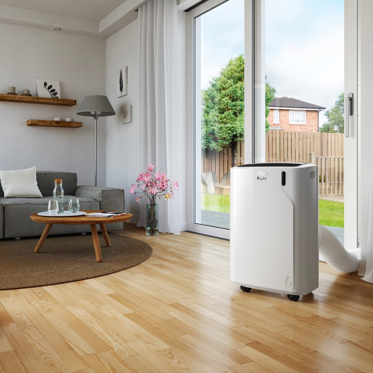 De'Longhi Pinguino Silent - Mobile air conditioning unit, for rooms up to 32.5 m², with dehumidifier & fan, 10500 BTU, quiet operation, remote control, 24h timer, energy efficiency class A (PACEM93K.1) - PACEM93K.1SILENT