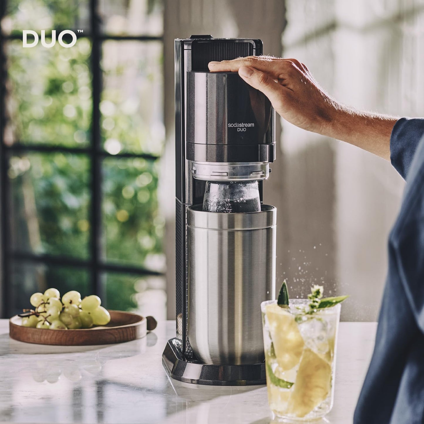 SodaStream water soda maker DUO Comfort set with Quick-Connect CO2 cylinder | Includes 2x 1L glass bottle, 2x 1L FUSE plastic bottle (dishwasher safe) and bottle drainer | Color: titanium - 1100463490
