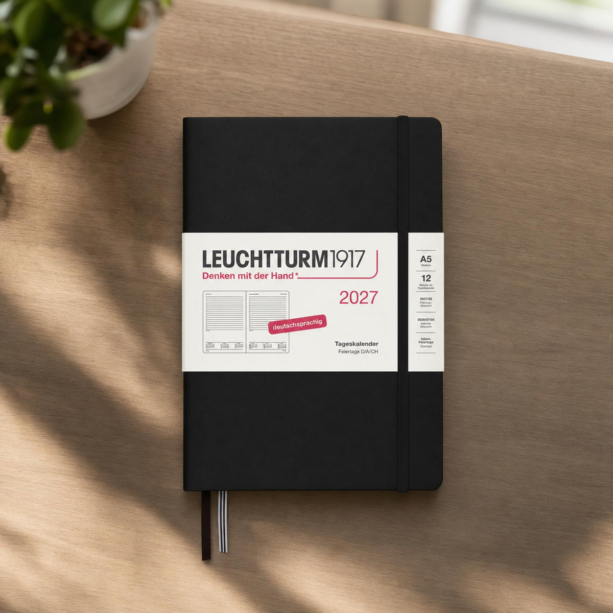 LEUCHTTURM1917 Daily Calendar 2027 Medium (A5) - German, black, 145 x 210 mm, January-December (12 months), 1 page per day, hourly grid 7:00-22:00, hardcover, 80 g/m² paper - 400157