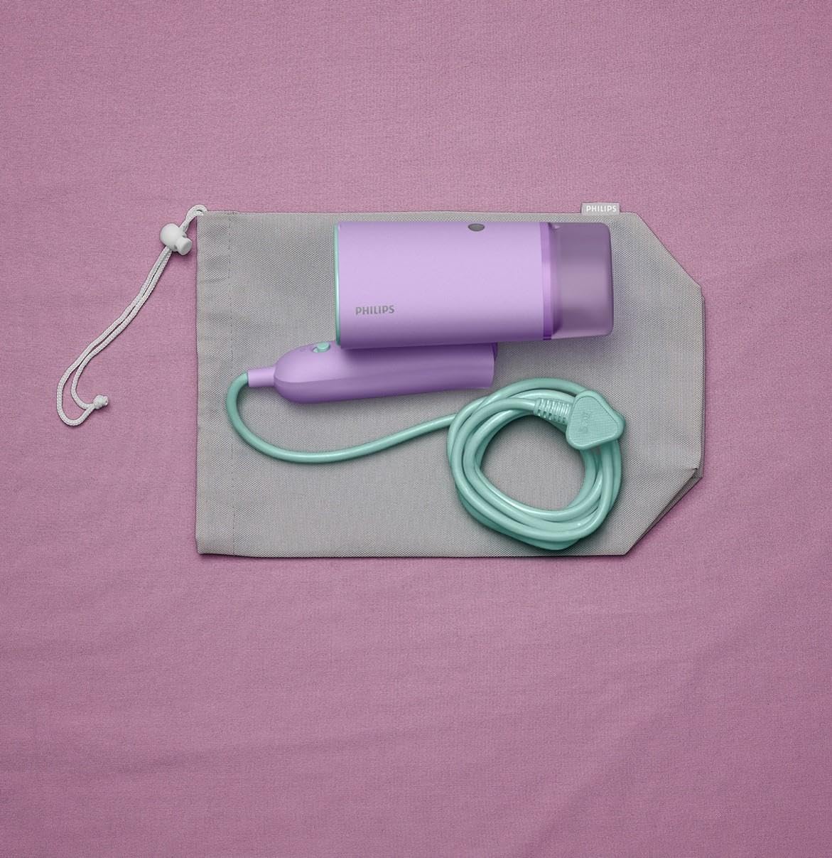 Philips 3000 Series Portable Steamer - 1000W, Steam Output 20g/min, 100ml Water Tank, No Ironing Board Required, Includes Storage Bag, 630g Light Weight, Purple (STH3010/30)