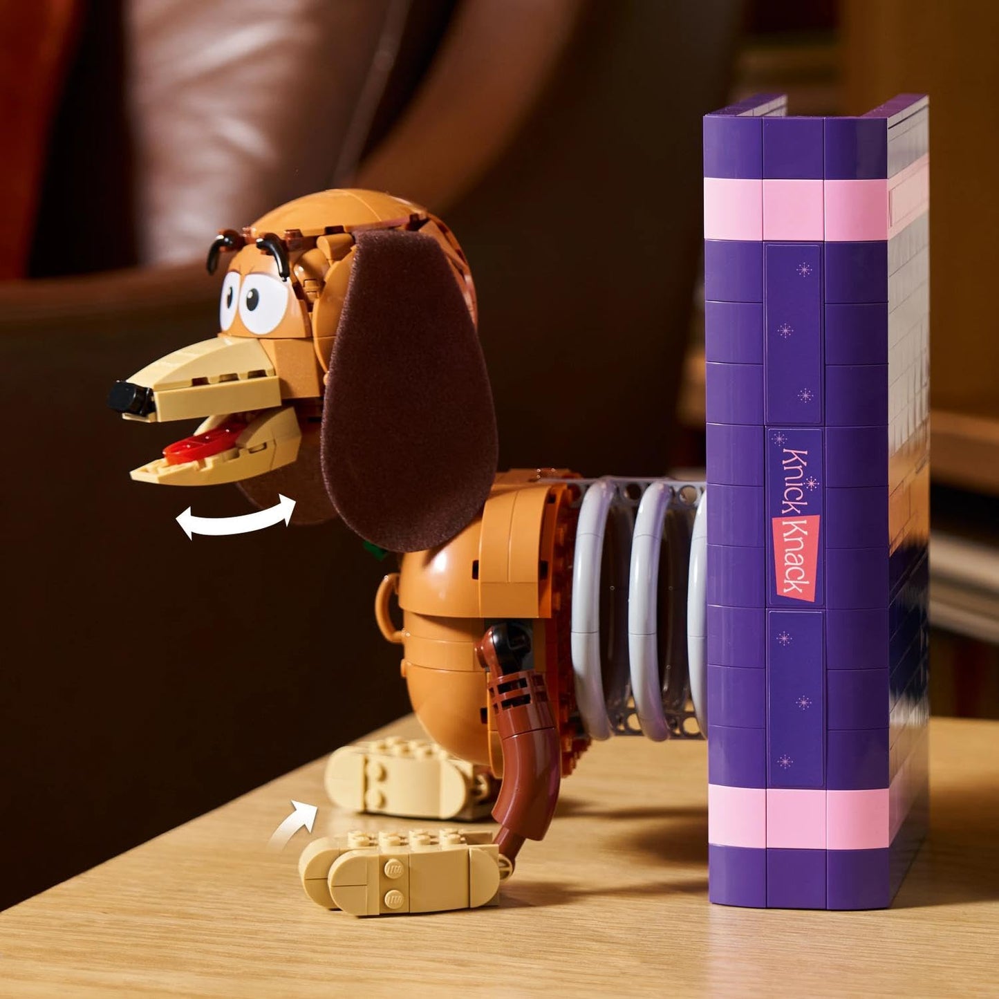 LEGO ǀ Disney and Pixar Toy Story: Slinky bookends - bookshelf decoration building set for adults - including Woody minifigure & dachshund figure - nostalgic gift for fans - 43301