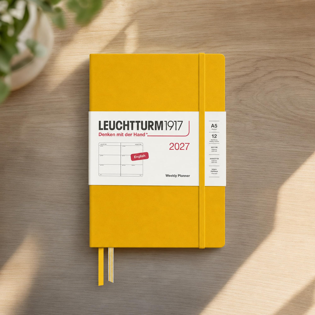 LEUCHTTURM1917 Calendar săptămânal 2027 Mediu (A5) - Engleză, Floarea-soarelui, Hardcover, 145 x 210 mm, 12 luni - ianuarie-decembrie 2027, 1 săptămână pe pagină dublă, hârtie de 80 g/m² cu compatibilitate ridicată cu cerneală - 400271