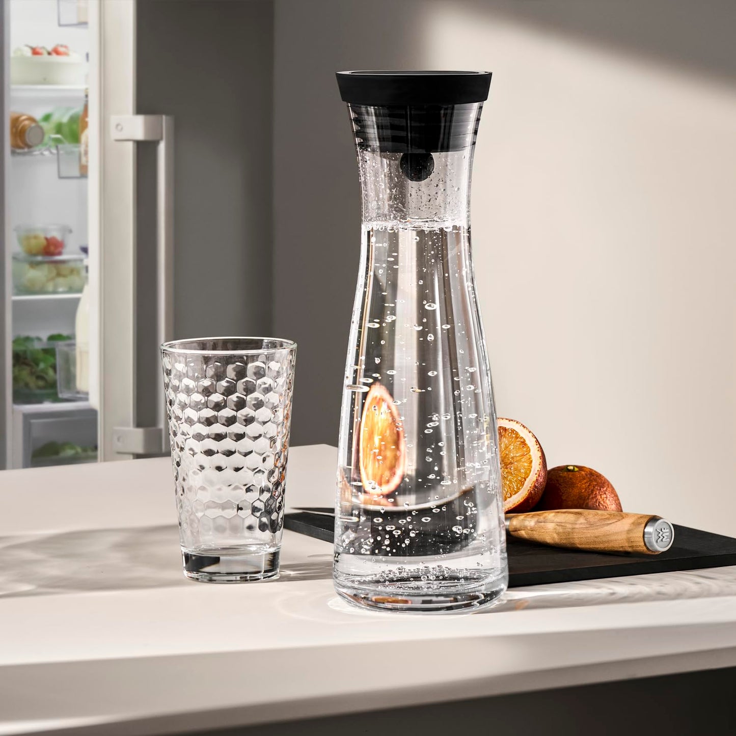 WMF Basic water carafe 1.5 l, glass carafe with lid 1.5 l, silicone lid, CloseUp closure made of Cromargan stainless steel, including sieve for holding back ice cubes and fruit - 617726040