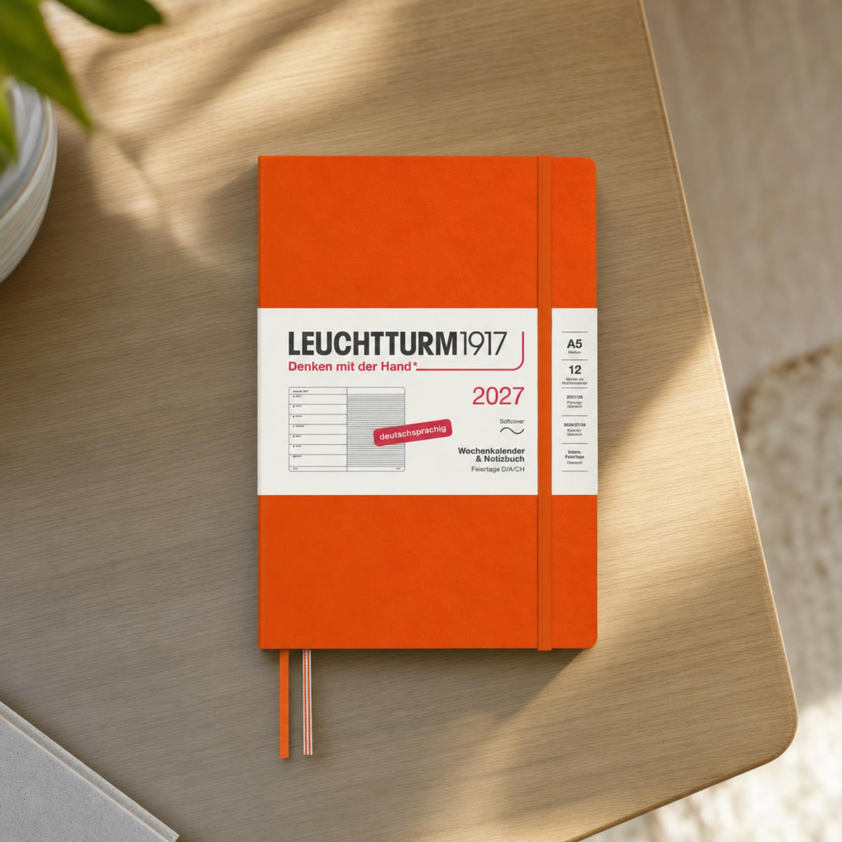 LEUCHTTURM1917 Weekly Calendar 2027 Medium (A5) with Notebook - Appointment Planner German, Pumpkin, Softcover, January-December 2027, Weekly Overview on the Left + Notes Page on the Right - 400069