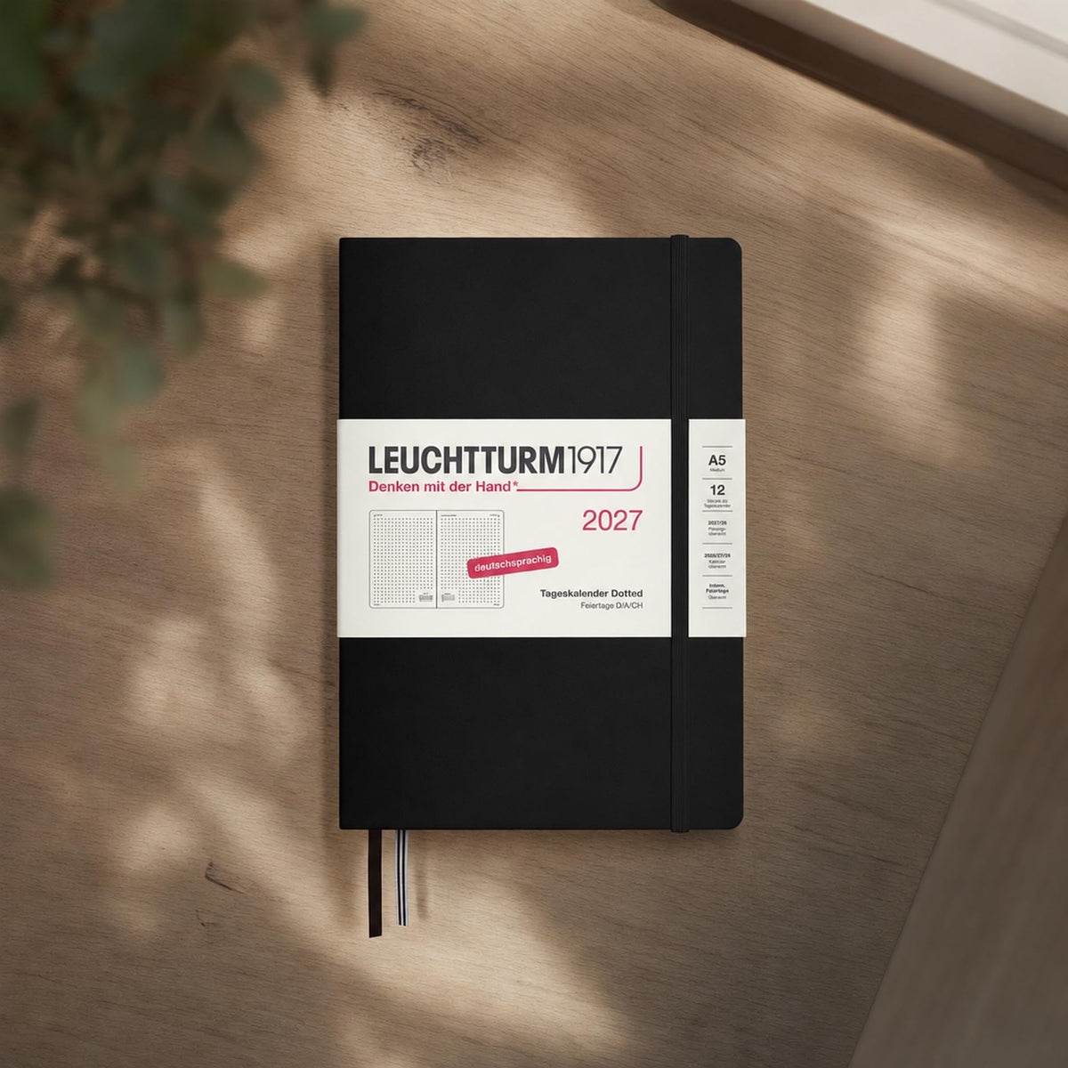 LEUCHTTURM1917 Daily Calendar 2027 Dotted Medium (A5) - German, black, 145 x 210 mm, January-December (12 months), 1 page per day, hourly grid 7:00-22:00, hardcover, 80 g/m² paper - 400166