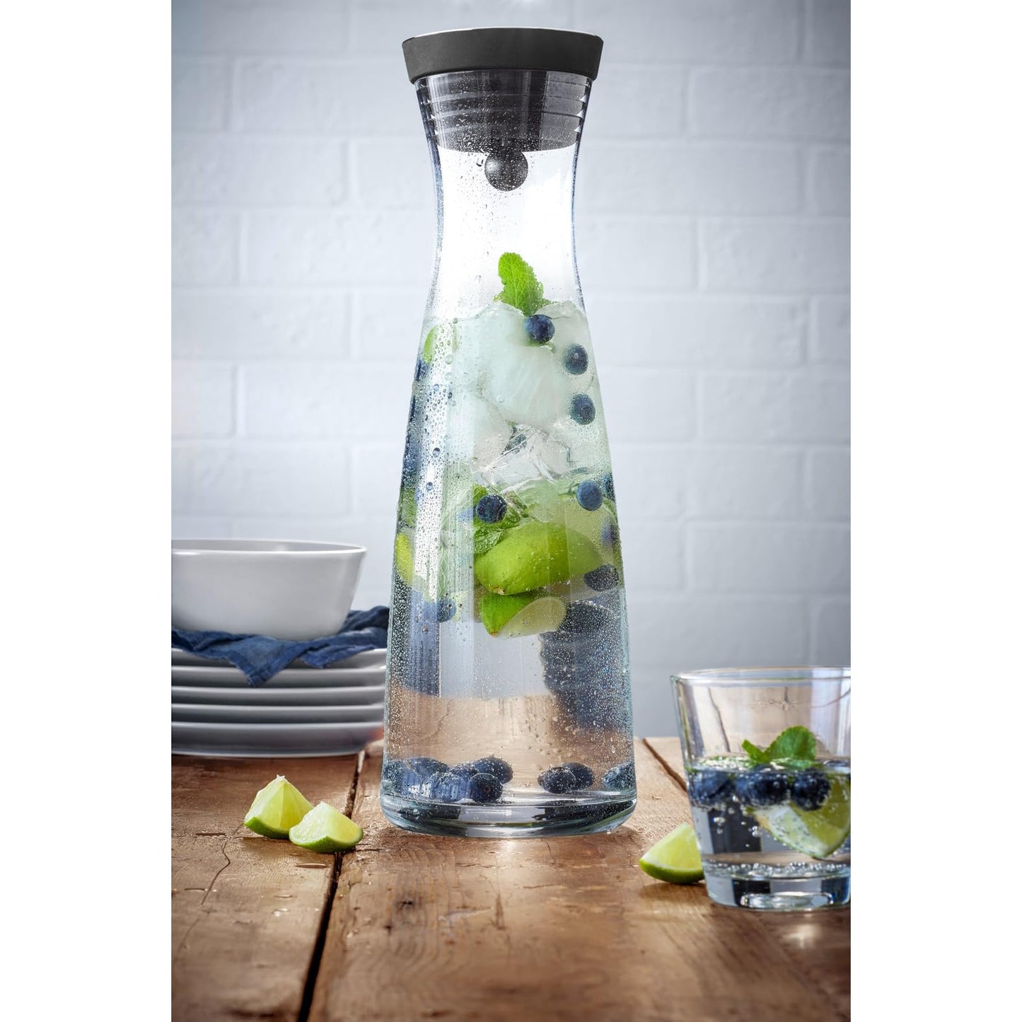 WMF Basic water carafe 1.5 l, glass carafe with lid 1.5 l, silicone lid, CloseUp closure made of Cromargan stainless steel, including sieve for holding back ice cubes and fruit - 617726040