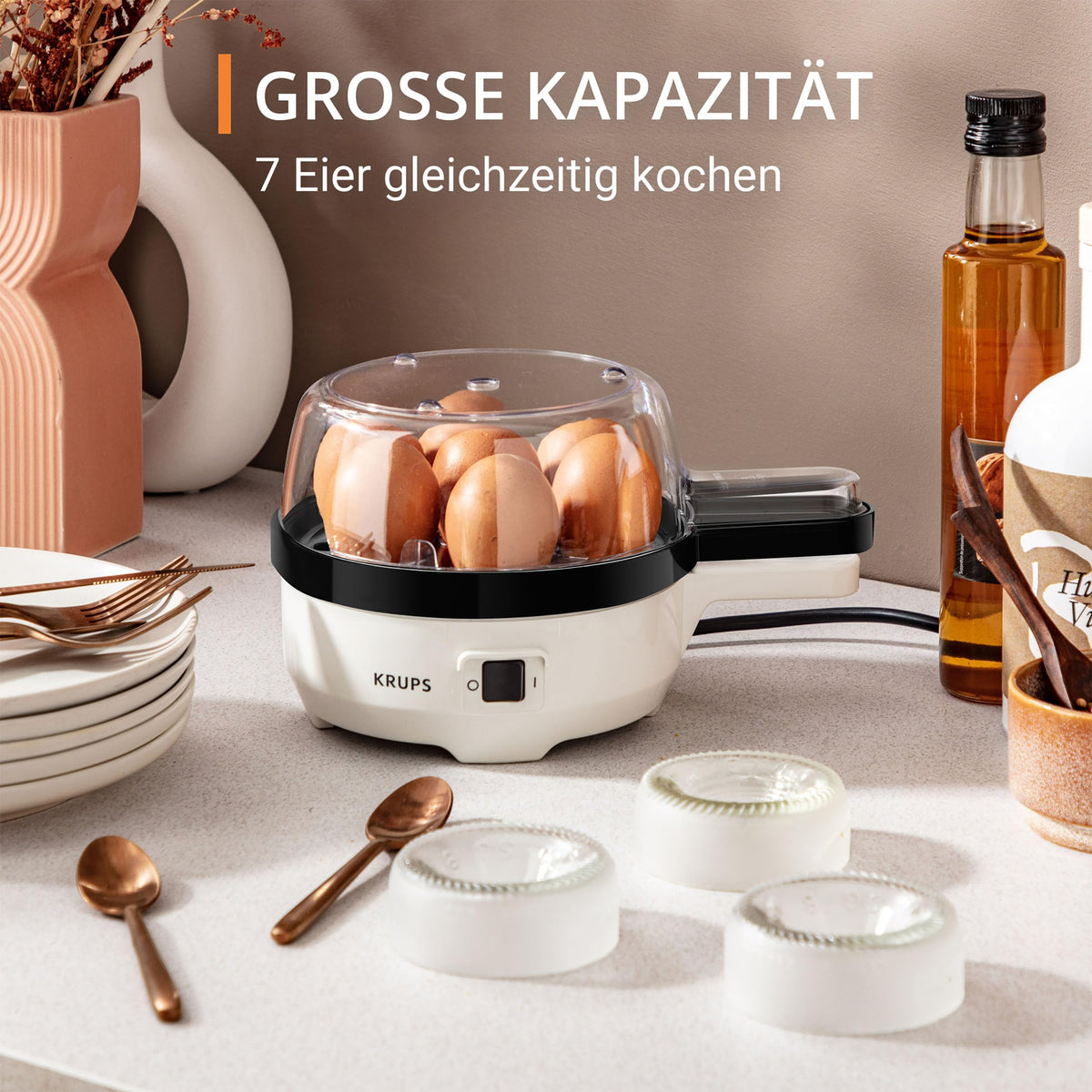 Krups Ovomat Spezial Eierkocher, pentru până la 7 ouă, inclusiv cană de măsurare a apei cu perforator pentru ouă, suport pentru ouă, semnal sonor, EG233115, Alb/Negru