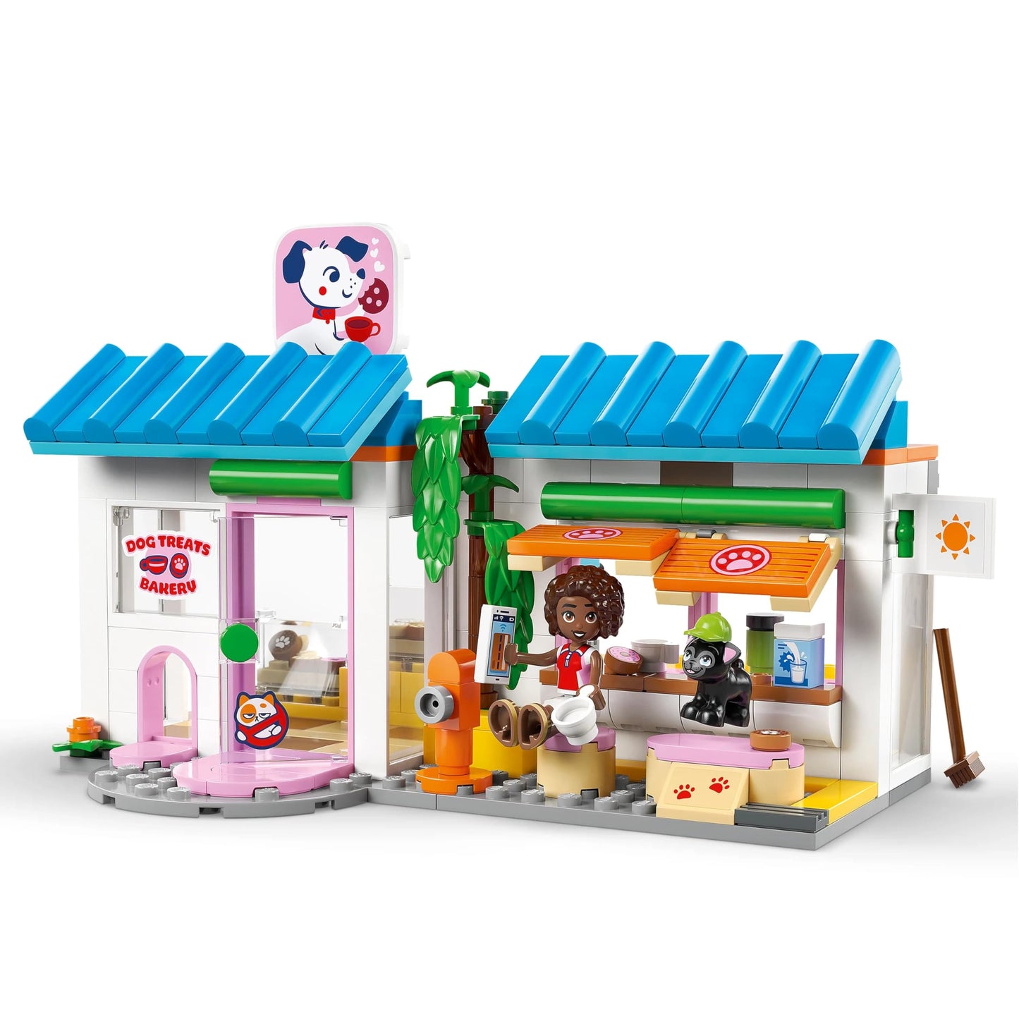 LEGO Friends dog cake bakery - children's shop with 2 mini dolls, 4 animal figures, animal carrier bag and toy food accessories - birthday gift for girls aged 6 and over - 42677