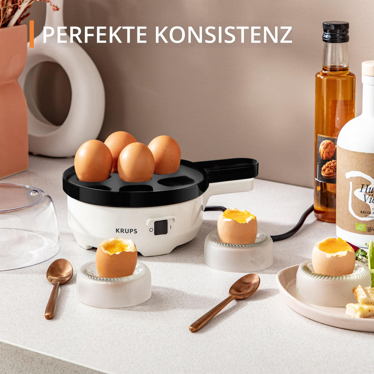 Krups Ovomat Spezial Eierkocher, pentru până la 7 ouă, inclusiv cană de măsurare a apei cu perforator pentru ouă, suport pentru ouă, semnal sonor, EG233115, Alb/Negru