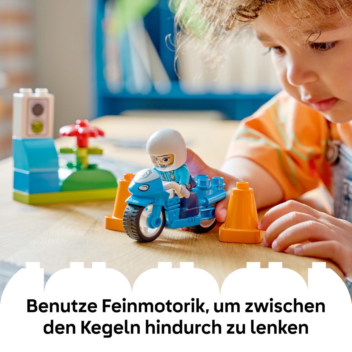 LEGO DUPLO Blue Police Motorcycle - educational toy to promote motor skills for toddlers - including motorcycle, police figure and traffic light - gift for boys and girls aged 2 and over - 10471