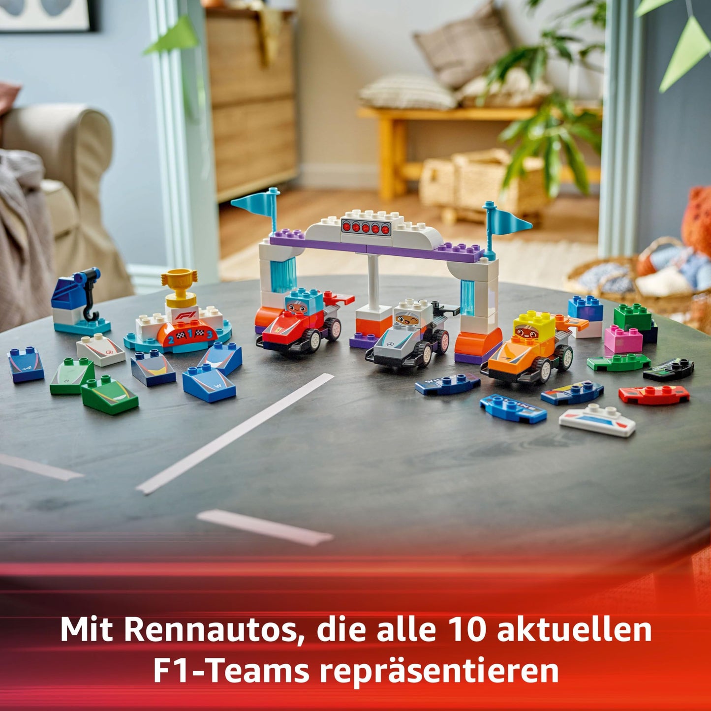 LEGO DUPLO Town F1 Team racing cars with racing drivers - Montessori toys for girls and boys - educational toys for children aged 2 and over - 10 toy cars with crane, starting lights, winner's podium - 10445