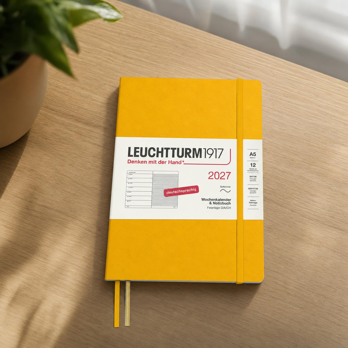 LEUCHTTURM1917 Calendar săptămânal 2027 mediu (A5) cu carnet - Jurnal german, floarea soarelui, copertă moale, ianuarie-decembrie 2027, prezentare generală săptămânală în stânga + pagină cu note în dreapta - 400070