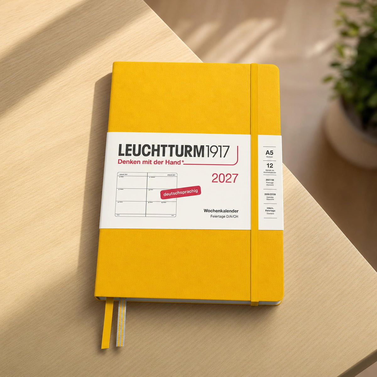 LEUCHTTURM1917 Calendar săptămânal 2027 Mediu (A5) - Germană, Floarea-soarelui, Hardcover, 145 x 210 mm, 12 luni - ianuarie-decembrie 2027, 1 săptămână pe pagină dublă, hârtie de 80 g/m² cu compatibilitate ridicată cu cerneală - 400104