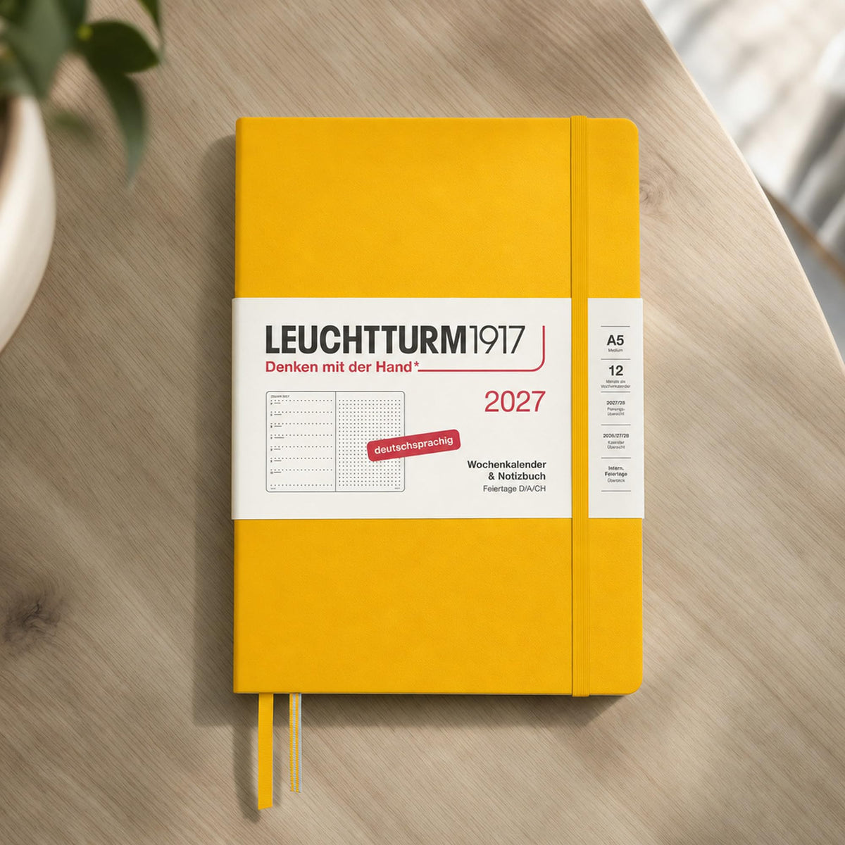 LEUCHTTURM1917 Calendar săptămânal 2027 punctat mediu (A5) cu caiet - Planificator de întâlniri german, floarea soarelui, ianuarie-decembrie 2027, prezentare generală săptămânală în stânga + pagină cu note în dreapta - 400093