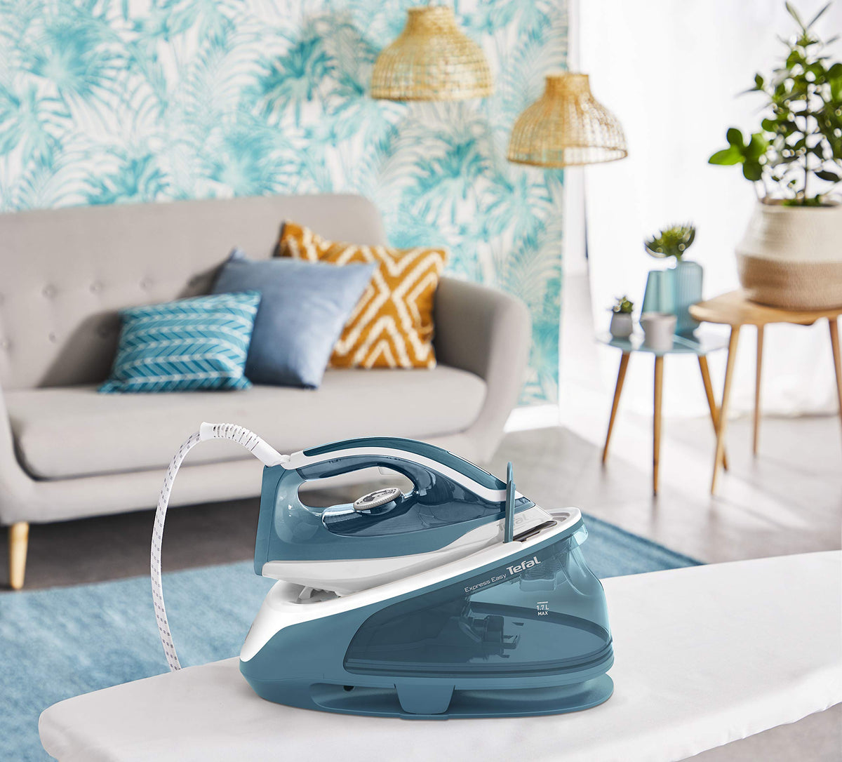 Tefal Express Easy Steam Station for all fabrics, quick ironing with high steam output, anti-calc system with removable calc collector, vertical steaming, and automatic shut-off, Turquoise/White. - SV6131