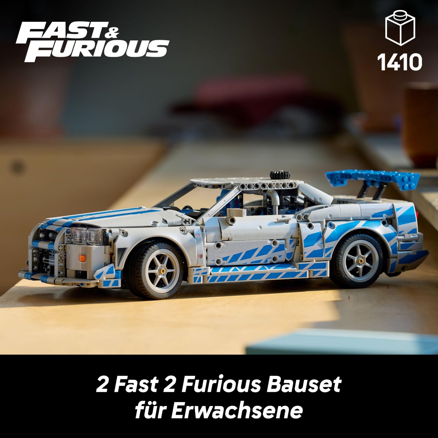 LEGO Technic 2 Fast 2 Furious Nissan Skyline GT-R (R34) speedster - car model for adults - with drift function, steering, suspension and 6-cylinder engine - collector's gift for fans - 42210