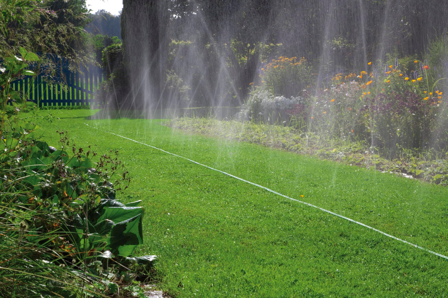 Gardena hose sprinkler: Fine spray sprinkler for watering elongated, narrow zones, length 15 m, ready for connection, green, can be individually shortened or extended (1998-20) - 01998-20